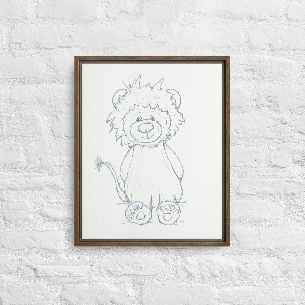 Framed drawing of a lion on a white brick wall